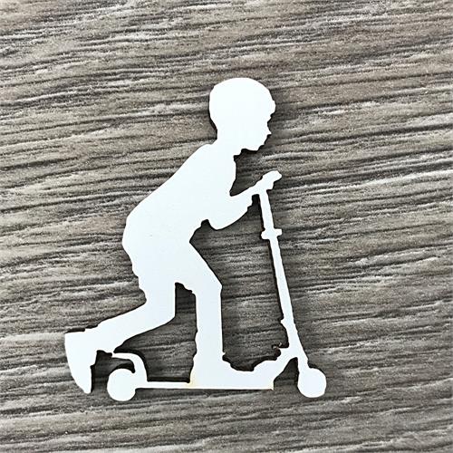 Boy riding scooter